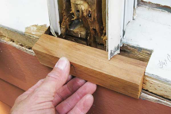 Window sill wood rot repair with replacement block